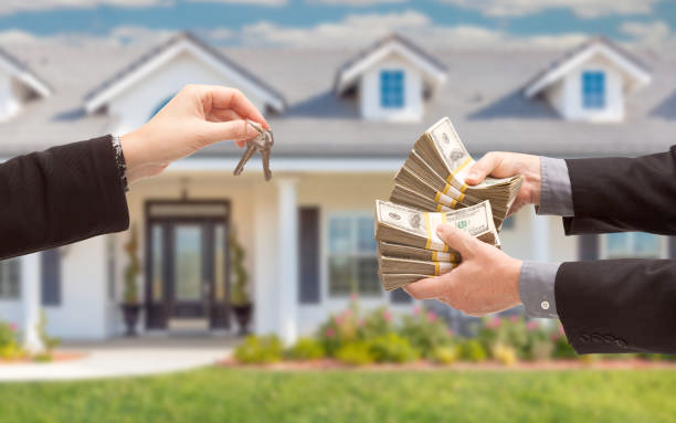 Happy homeowner receiving a cash offer for their house